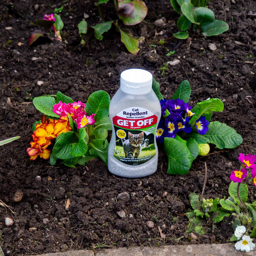 Get Off Cat Repellent 600ml among spring flowers