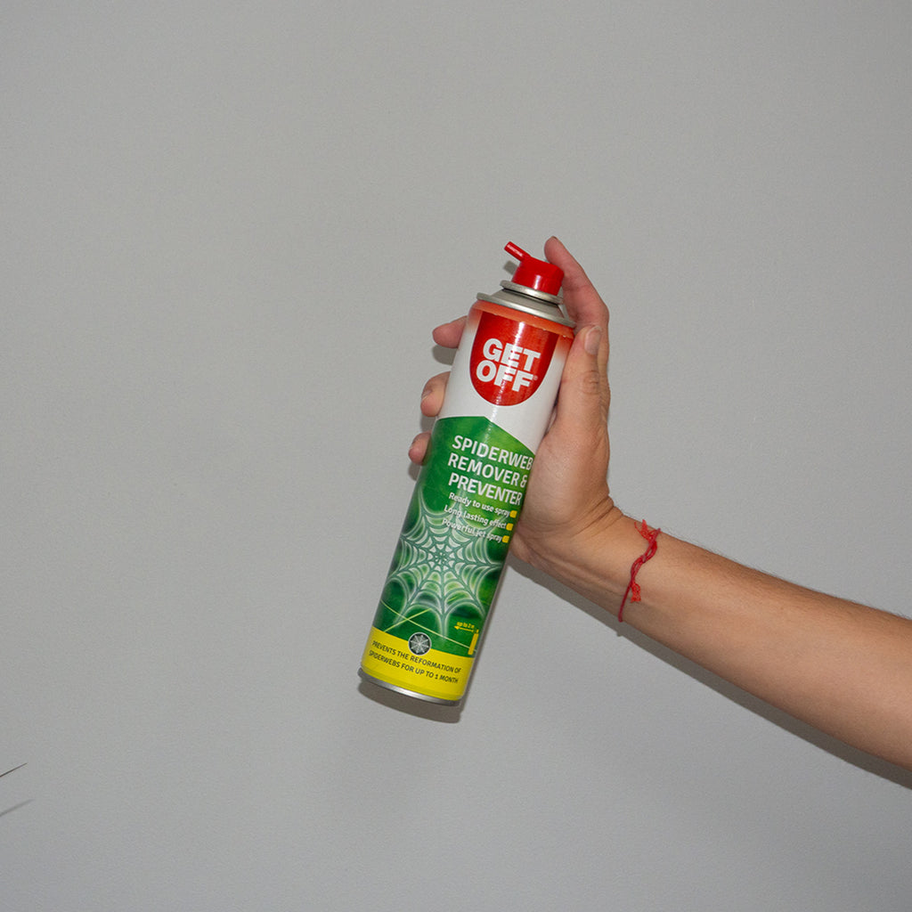 Holding Get Off Spiderweb Remover & Preventer