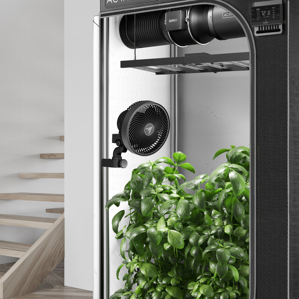 AC Infinity Cloudray S9 clip fan mounted in a grow tent with plants