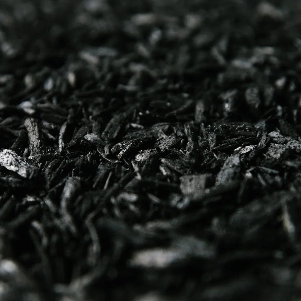Close-up of Soil Ninja Biochar flakes, porous peat-free potting soil amendment